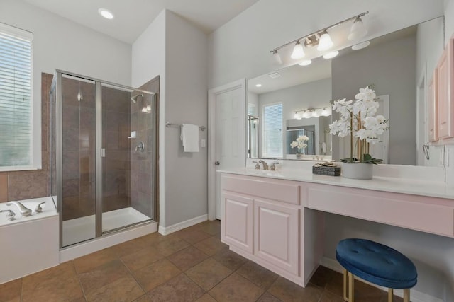 7617 Roaring Springs Dr, Austin, TX 78736 - bathroom featuring a stall shower, vanity, and a garden tub