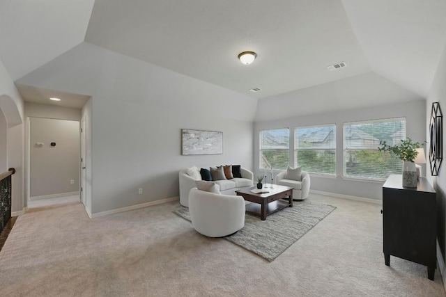 7617 Roaring Springs Dr, Austin, TX 78736 - carpeted living room featuring vaulted ceiling and baseboards