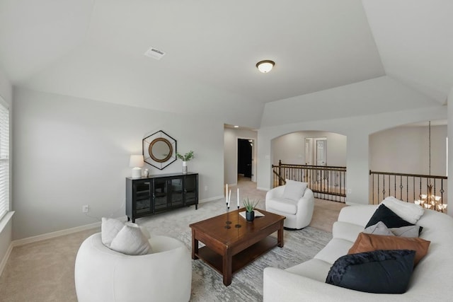 7617 Roaring Springs Dr, Austin, TX 78736 - living area with lofted ceiling, carpet floors, and arched walkways