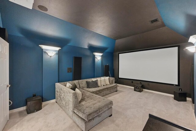 7617 Roaring Springs Dr, Austin, TX 78736 - home theater room featuring carpet and vaulted ceiling