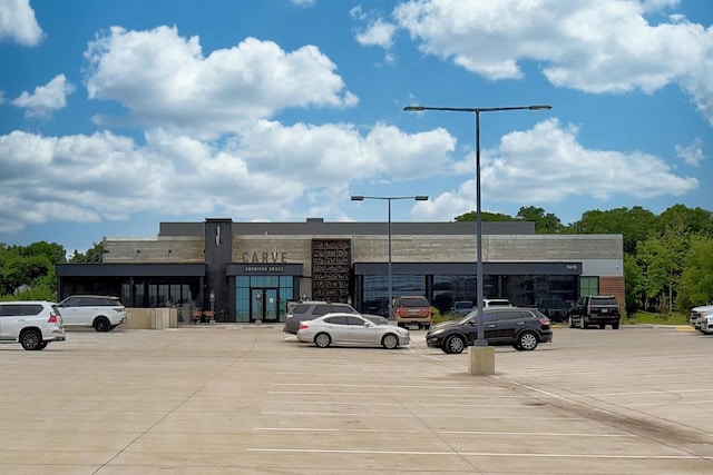 7617 Roaring Springs Dr, Austin, TX 78736 - view of commercial property with uncovered parking