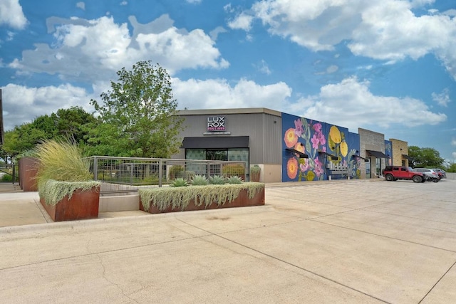 7617 Roaring Springs Dr, Austin, TX 78736 - view of commercial location featuring uncovered parking