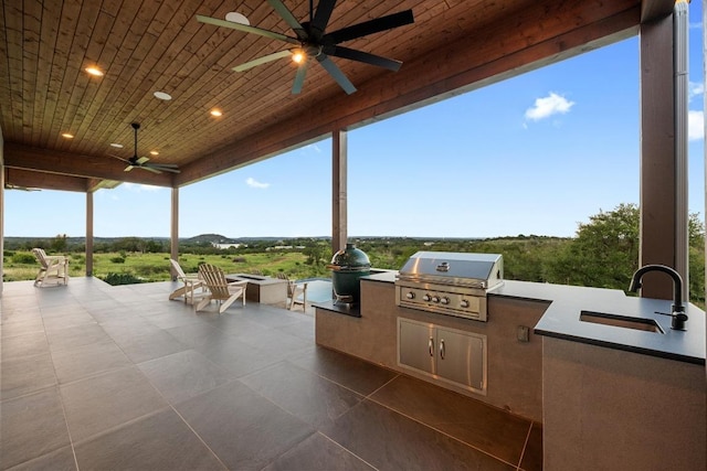 111 Rock N Robyn Trl, Horseshoe Bay, TX 78657 - view of patio with area for grilling and ceiling fan