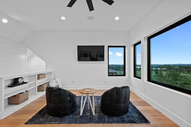 111 Rock N Robyn Trl, Horseshoe Bay, TX 78657 - living area featuring wood finished floors, a ceiling fan, and recessed lighting