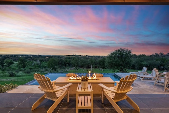 111 Rock N Robyn Trl, Horseshoe Bay, TX 78657 - view of patio / terrace with an outdoor fire pit and an infinity pool