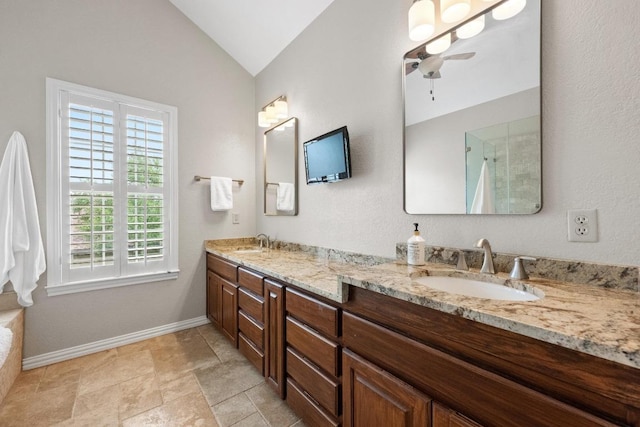 509 Explorer Dr, Lakeway, TX 78734 - full bathroom with double vanity, vaulted ceiling, ceiling fan, and a shower