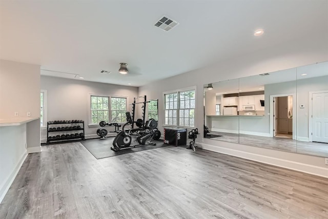 7503 Stonecliff Cir, Austin, TX 78731 - exercise room with light wood-style floors, recessed lighting, and ceiling fan