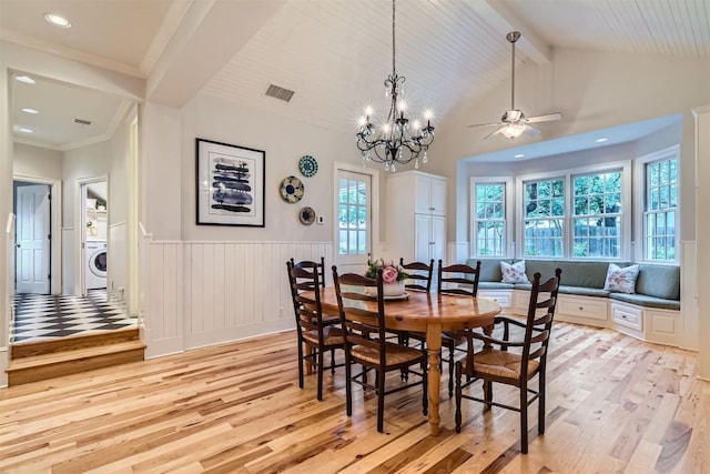 7503 Stonecliff Cir, Austin, TX 78731 - dining space with washer / clothes dryer, light wood-style floors, wainscoting, a chandelier, and ceiling fan