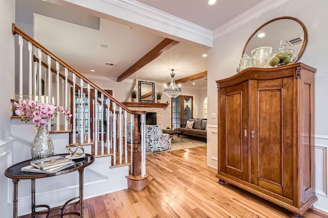 7503 Stonecliff Cir, Austin, TX 78731 - entryway with stairway, light wood-style floors, recessed lighting, a chandelier, and beamed ceiling