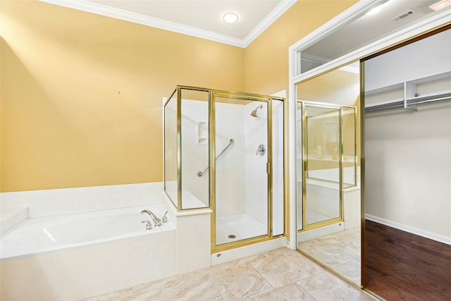130 Enchanted Dr, Georgetown, TX 78633 - full bath featuring a bath, crown molding, and a stall shower