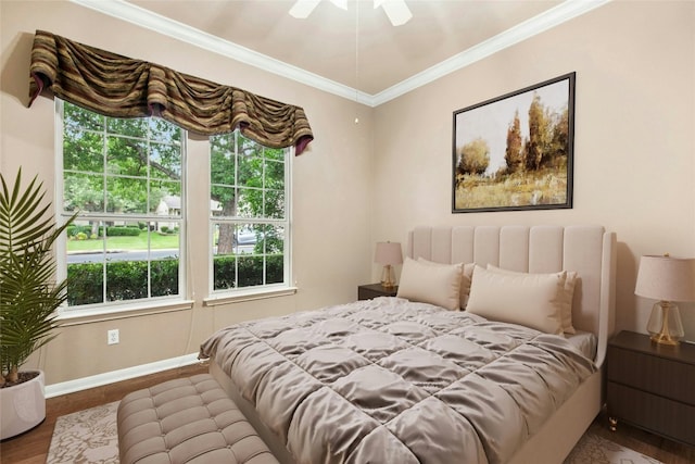 130 Enchanted Dr, Georgetown, TX 78633 - bedroom with crown molding, wood finished floors, and a ceiling fan