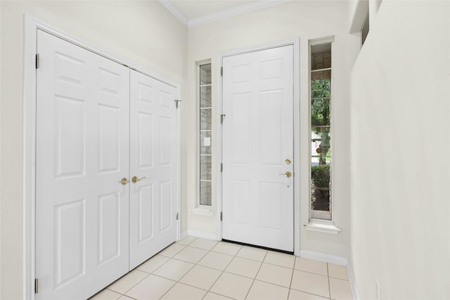 130 Enchanted Dr, Georgetown, TX 78633 - foyer entrance with ornamental molding and light tile patterned floors