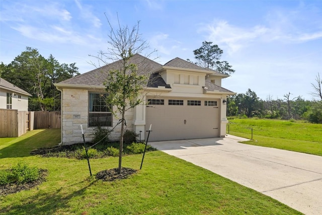 147 William Hersee Dr, Bastrop, TX 78602 - view of front of home featuring stone siding, concrete driveway, a shingled roof, and a garage