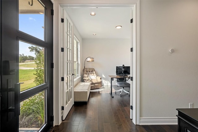 147 William Hersee Dr, Bastrop, TX 78602 - hall featuring an office area, dark wood finished floors, and recessed lighting
