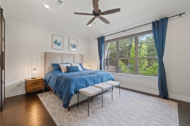 147 William Hersee Dr, Bastrop, TX 78602 - bedroom with hardwood / wood-style floors, recessed lighting, and ceiling fan