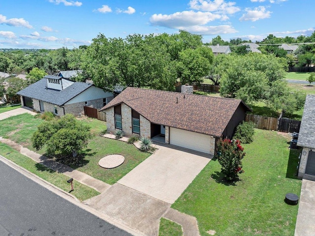 907 Great Oaks Cv, Round Rock, TX 78681 - view of front of house with a garage and concrete driveway