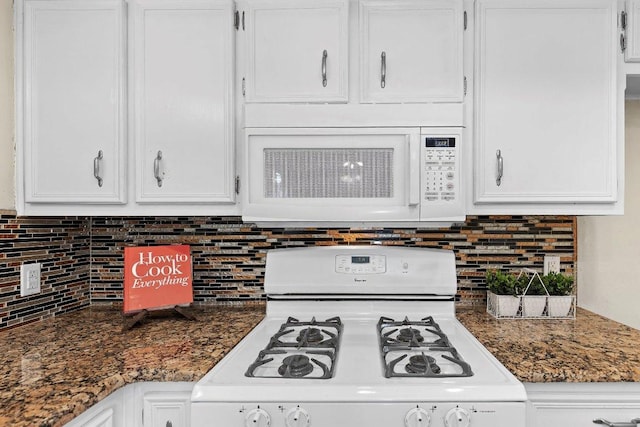 907 Great Oaks Cv, Round Rock, TX 78681 - kitchen view of white appliances, white cabinetry, and tasteful backsplash