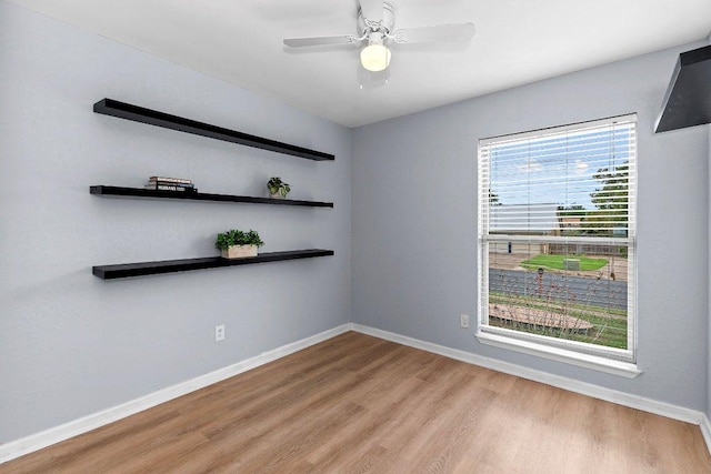 907 Great Oaks Cv, Round Rock, TX 78681 - unfurnished room featuring wood finished floors and a ceiling fan