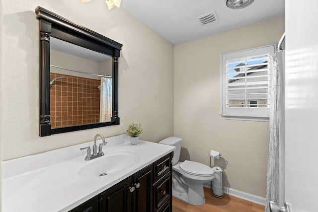 907 Great Oaks Cv, Round Rock, TX 78681 - full bathroom featuring vanity, wood finished floors, and curtained shower