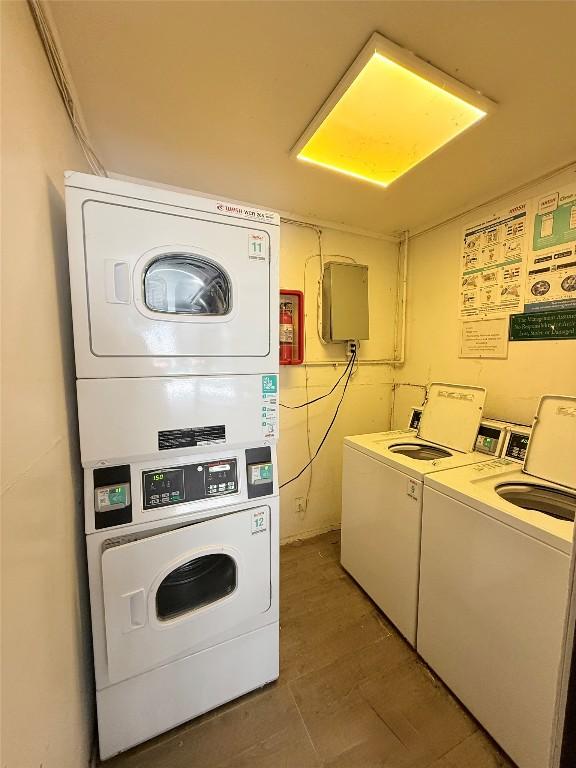 2704 Salado St Unit 207, Austin, TX 78705 - communal laundry room with stacked washing machine and dryer and washer and clothes dryer