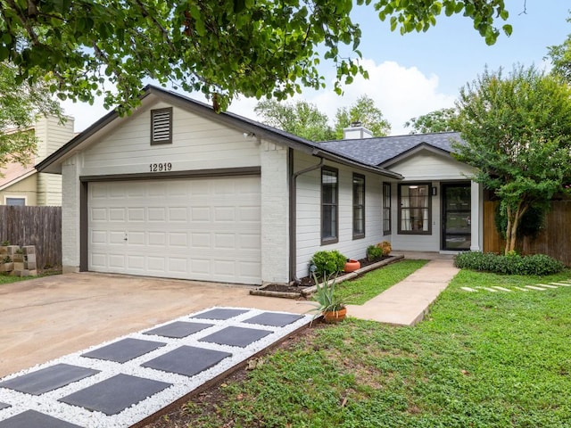 12919 Margit Dr, Austin, TX 78729 - ranch-style house featuring an attached garage, driveway, a shingled roof, and brick siding