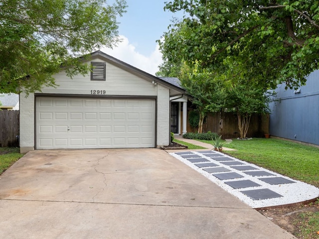 12919 Margit Dr, Austin, TX 78729 - ranch-style home featuring driveway, an attached garage, and brick siding