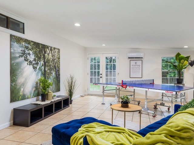 12919 Margit Dr, Austin, TX 78729 - tiled living room featuring a wall unit AC, french doors, recessed lighting, and plenty of natural light