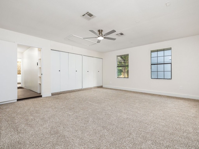 12919 Margit Dr, Austin, TX 78729 - unfurnished bedroom featuring attic access, carpet floors, and ceiling fan