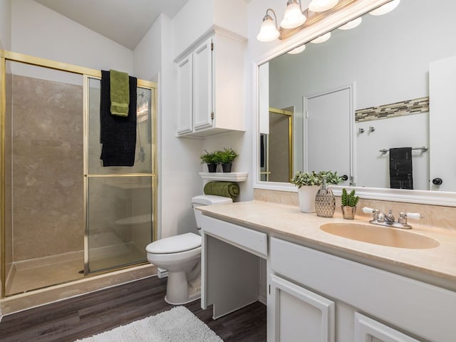12919 Margit Dr, Austin, TX 78729 - full bath with wood finished floors, vanity, and a shower stall