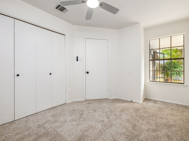 12919 Margit Dr, Austin, TX 78729 - unfurnished bedroom with carpet flooring, a closet, and ceiling fan