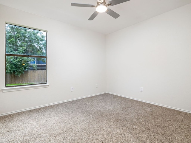 12919 Margit Dr, Austin, TX 78729 - empty room featuring carpet and a ceiling fan