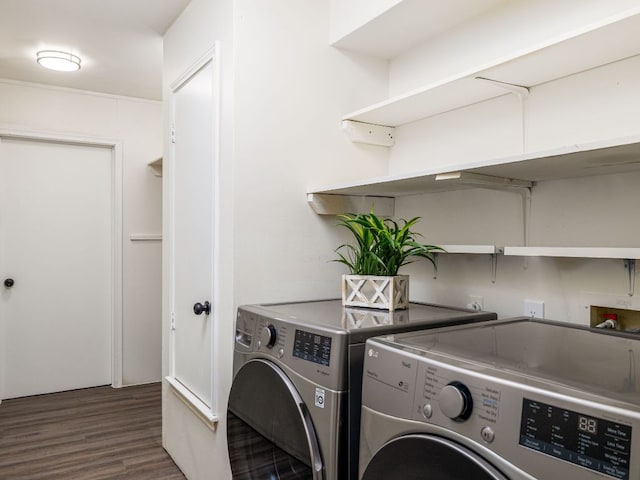 12919 Margit Dr, Austin, TX 78729 - laundry room with washing machine and clothes dryer and wood finished floors