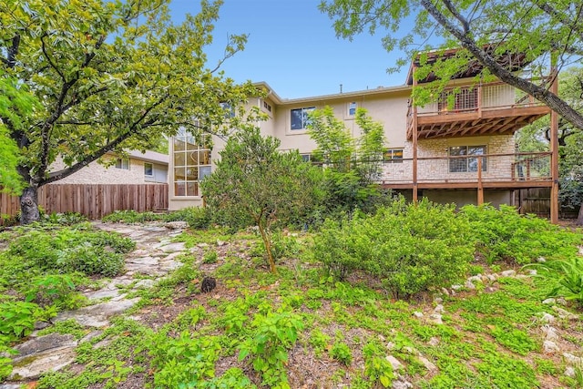 6819 Bayridge Ter, Austin, TX 78759 - rear view of house with a balcony and stucco siding