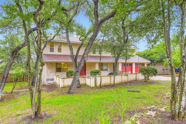 6819 Bayridge Ter, Austin, TX 78759 - view of front of home with stone siding and covered porch
