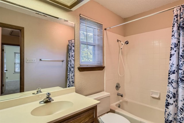 6819 Bayridge Ter, Austin, TX 78759 - full bath featuring vanity, shower / bath combination with curtain, and a textured wall