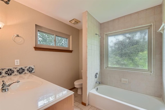 6819 Bayridge Ter, Austin, TX 78759 - bathroom featuring plenty of natural light, tile patterned flooring, vanity, and  shower combination