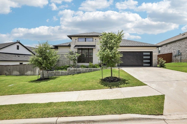 412 Pin Cherry Pass, San Marcos, TX 78666 - prairie-style house featuring concrete driveway, an attached garage, stucco siding, and stone siding