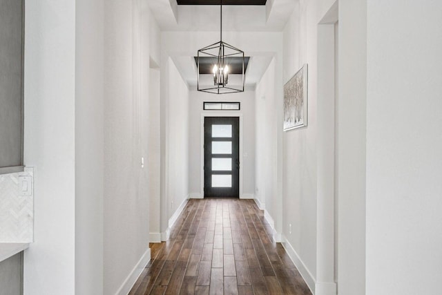 412 Pin Cherry Pass, San Marcos, TX 78666 - doorway to outside with a chandelier and dark wood finished floors