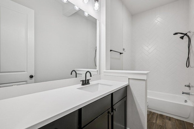 412 Pin Cherry Pass, San Marcos, TX 78666 - full bath with wood finished floors, vanity, and shower / bath combination