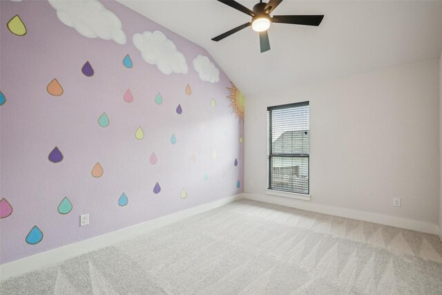 412 Pin Cherry Pass, San Marcos, TX 78666 - unfurnished room featuring lofted ceiling, light carpet, and a ceiling fan