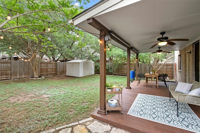 11024 Mint Julep Dr, Austin, TX 78748 - deck with a ceiling fan, a fenced backyard, a storage shed, and outdoor dining space