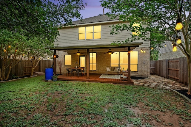 11024 Mint Julep Dr, Austin, TX 78748 - rear view of house with ceiling fan, a fenced backyard, a deck, and brick siding