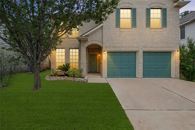11024 Mint Julep Dr, Austin, TX 78748 - view of front of property with driveway, brick siding, a front yard, and an attached garage