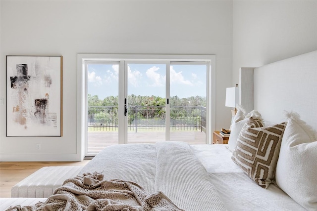 3901 Peak Lookout Dr, Austin, TX 78738 - bedroom featuring access to exterior and wood finished floors