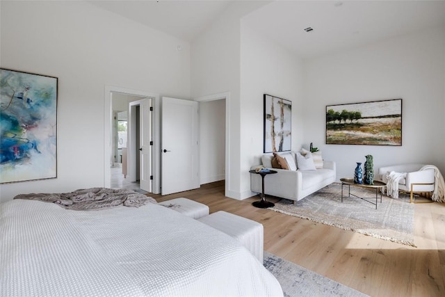 3901 Peak Lookout Dr, Austin, TX 78738 - bedroom with a high ceiling and wood finished floors