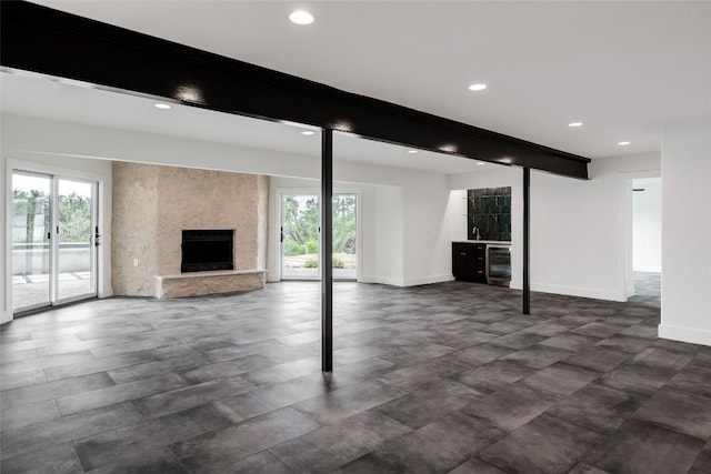 3901 Peak Lookout Dr, Austin, TX 78738 - unfurnished living room featuring a high end fireplace and recessed lighting