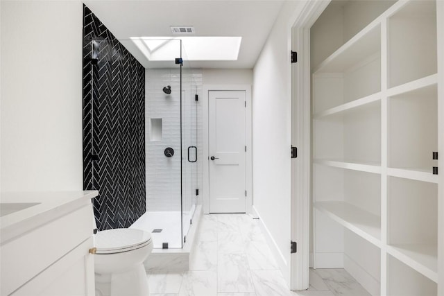3901 Peak Lookout Dr, Austin, TX 78738 - bathroom with marble look tiles, a skylight, a stall shower, and vanity