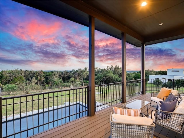 3901 Peak Lookout Dr, Austin, TX 78738 - deck at dusk featuring an outdoor hangout area and view of scattered trees