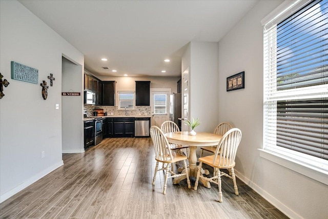 132 Ancellotta Way, Leander, TX 78641 - dining area featuring wood finished floors and recessed lighting