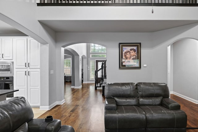 15413 Echo Hills Dr, Austin, TX 78717 - living room with arched walkways and wood finished floors